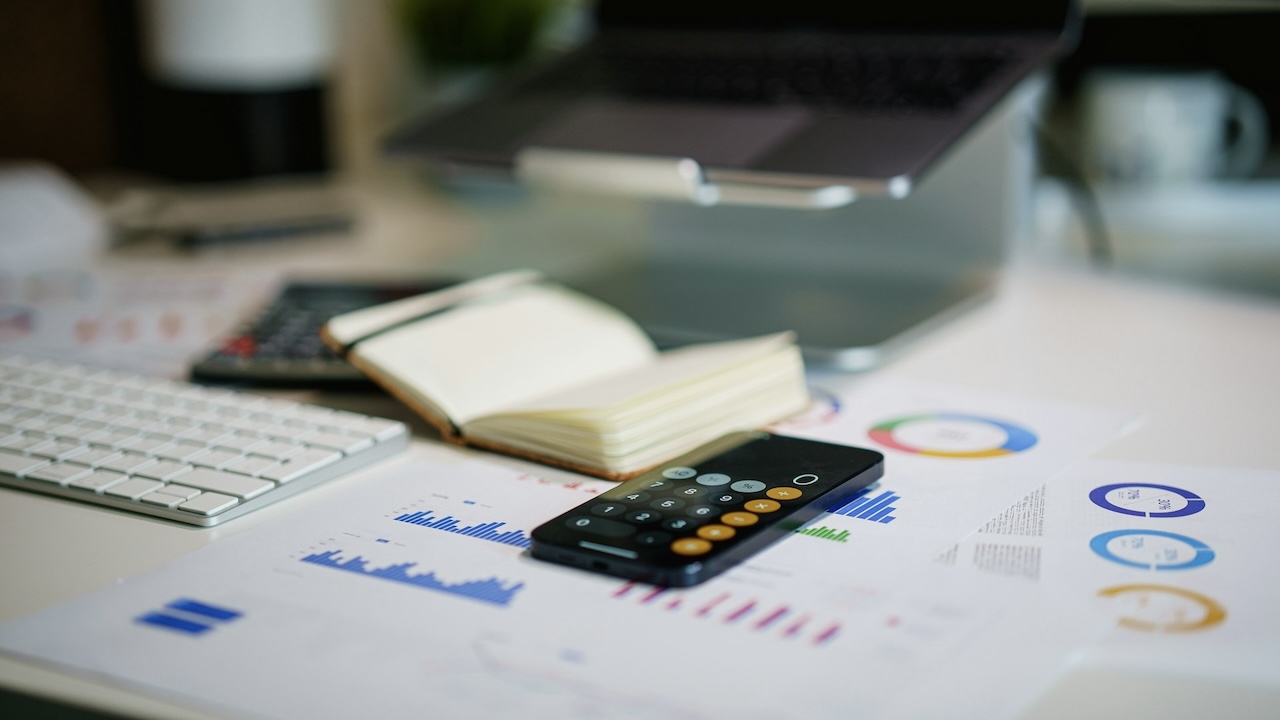 Manager reviewing assessment data to decide who is the best candidate for the role