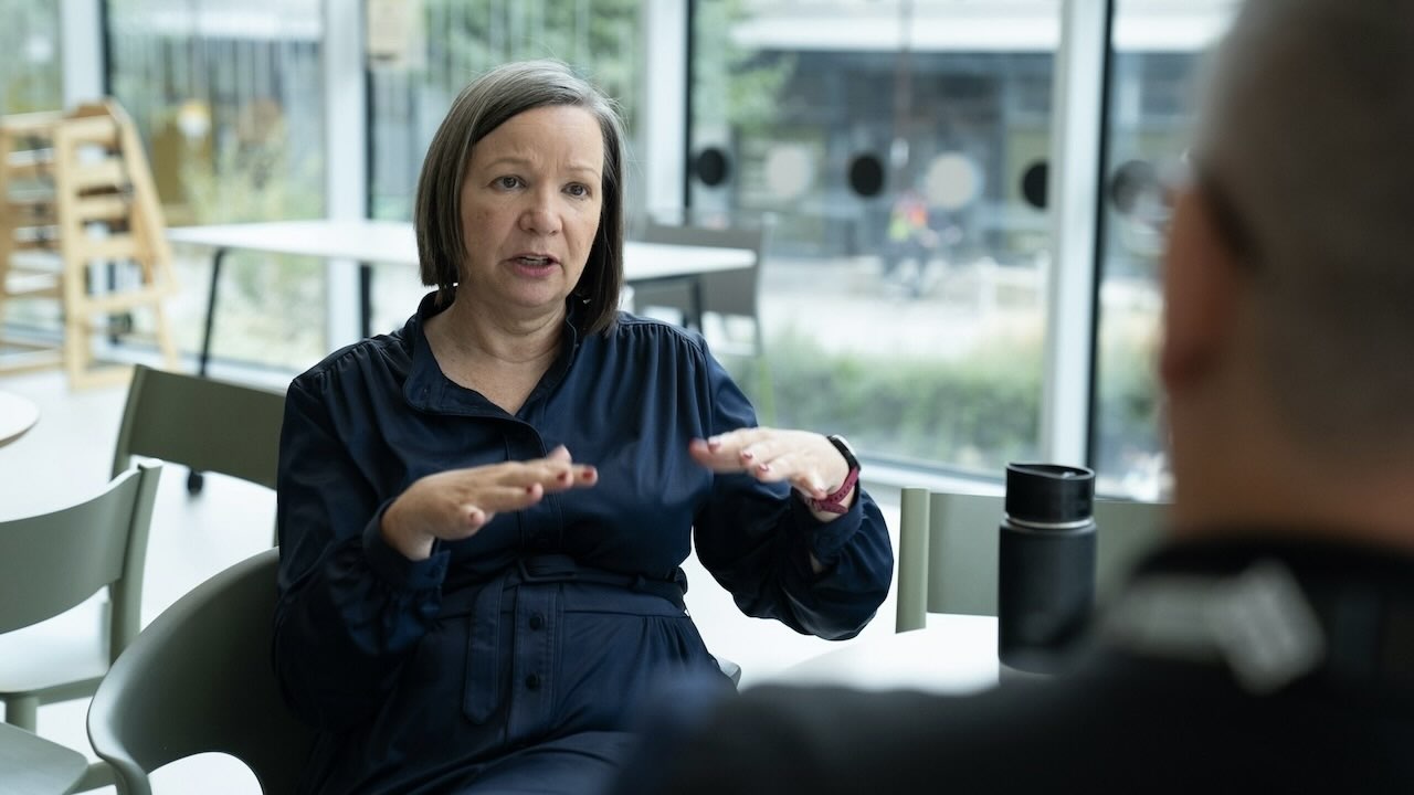 Busioness woman sharing her knowledge with peers