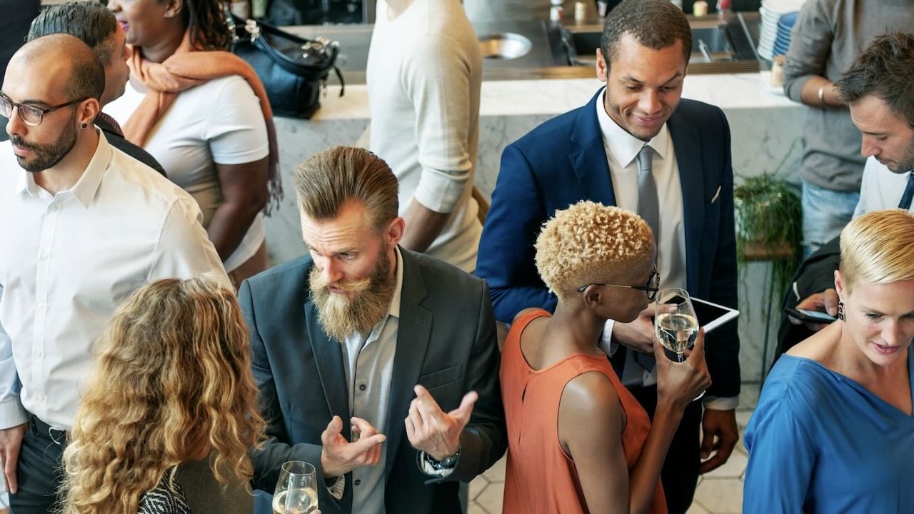 Various business people networking at an event