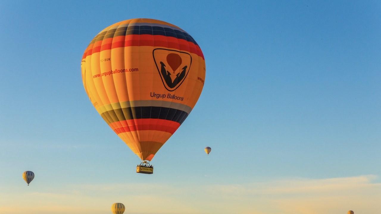 Various colourful hot air ballons in the sky